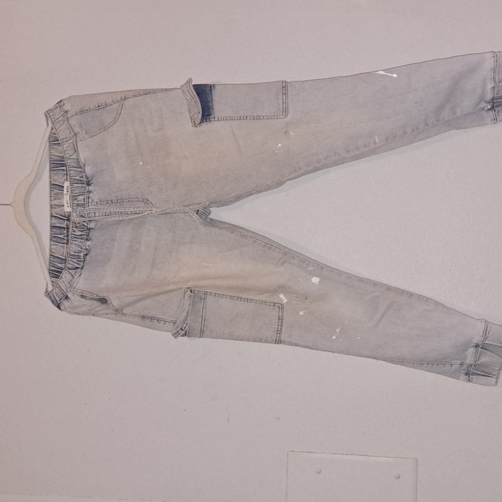 Pants with white paint